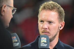 Bundestrainer Julian Nagelsmann im Gespräch mit RTL und Florian König in der UEFA Nations League am 10.September 2024. (Photo by Nicolas TUCAT / AFP)